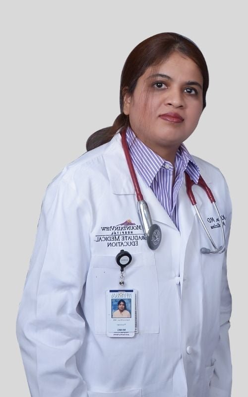 Samira Khan, MD, in a white coat with a stethoscope Samira Khan, MD, in a white coat with a stethoscope